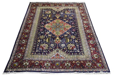 Lot 643 - A Tabriz carpet