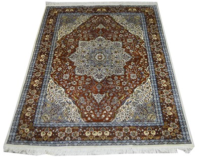 Lot 437 - A Tabriz carpet