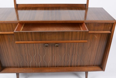 Lot 655 - Everest: a mid Century walnut Helix pattern sideboard.