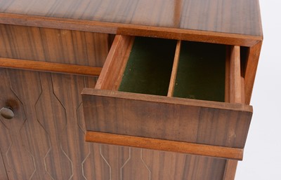 Lot 655 - Everest: a mid Century walnut Helix pattern sideboard.