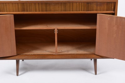Lot 655 - Everest: a mid Century walnut Helix pattern sideboard.