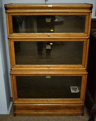 Lot 225 - The Globe-Wernicke Co. Ltd, London: a light oak three tier sectional bookcase