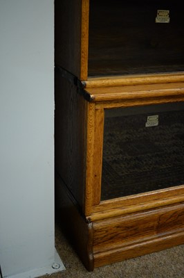 Lot 225 - The Globe-Wernicke Co. Ltd, London: a light oak three tier sectional bookcase