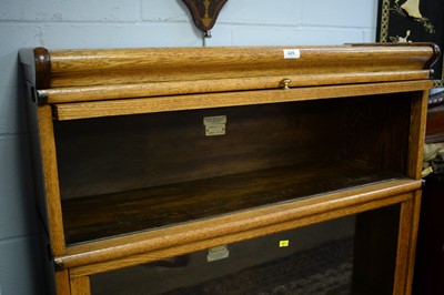 Lot 225 - The Globe-Wernicke Co. Ltd, London: a light oak three tier sectional bookcase