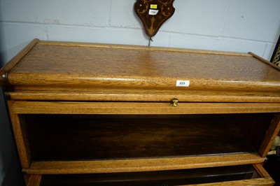 Lot 225 - The Globe-Wernicke Co. Ltd, London: a light oak three tier sectional bookcase