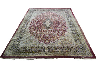 Lot 318 - A large Kirman carpet