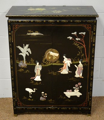 Lot 45 - A 20th Century Chinese black lacquered side cabinet