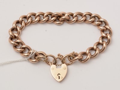 Lot 82 - A George V yellow-metal curb-link bracelet.