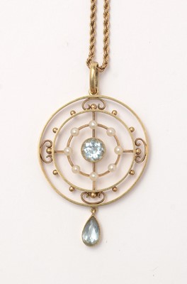 Lot 116 - An Edwardian aquamarine and seed pearl pendant on chain.