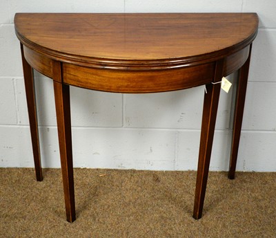 Lot 39 - A 19th C. mahogany demi-lune tea table.