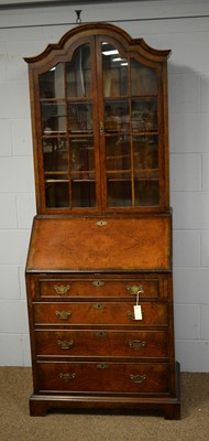 Lot 58 - A 20th Century Queen Anne style walnut bureau bookcase