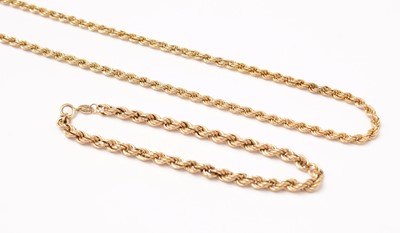 Lot 133 - A 9ct gold rope-link necklace and bracelet.
