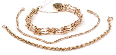 Lot 141 - Three 9ct gold and yellow-metal bracelets.