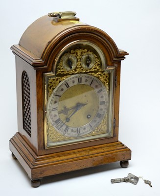 Lot 331 - A 19th C German oak cased bracket clock.