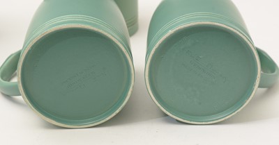 Lot 601 - A set of eight Wedgwood mugs designed by Keith Murray.