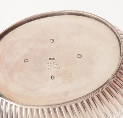 Lot 24 - A silver bachelor's three piece tea service.
