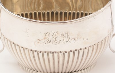 Lot 24 - A silver bachelor's three piece tea service.