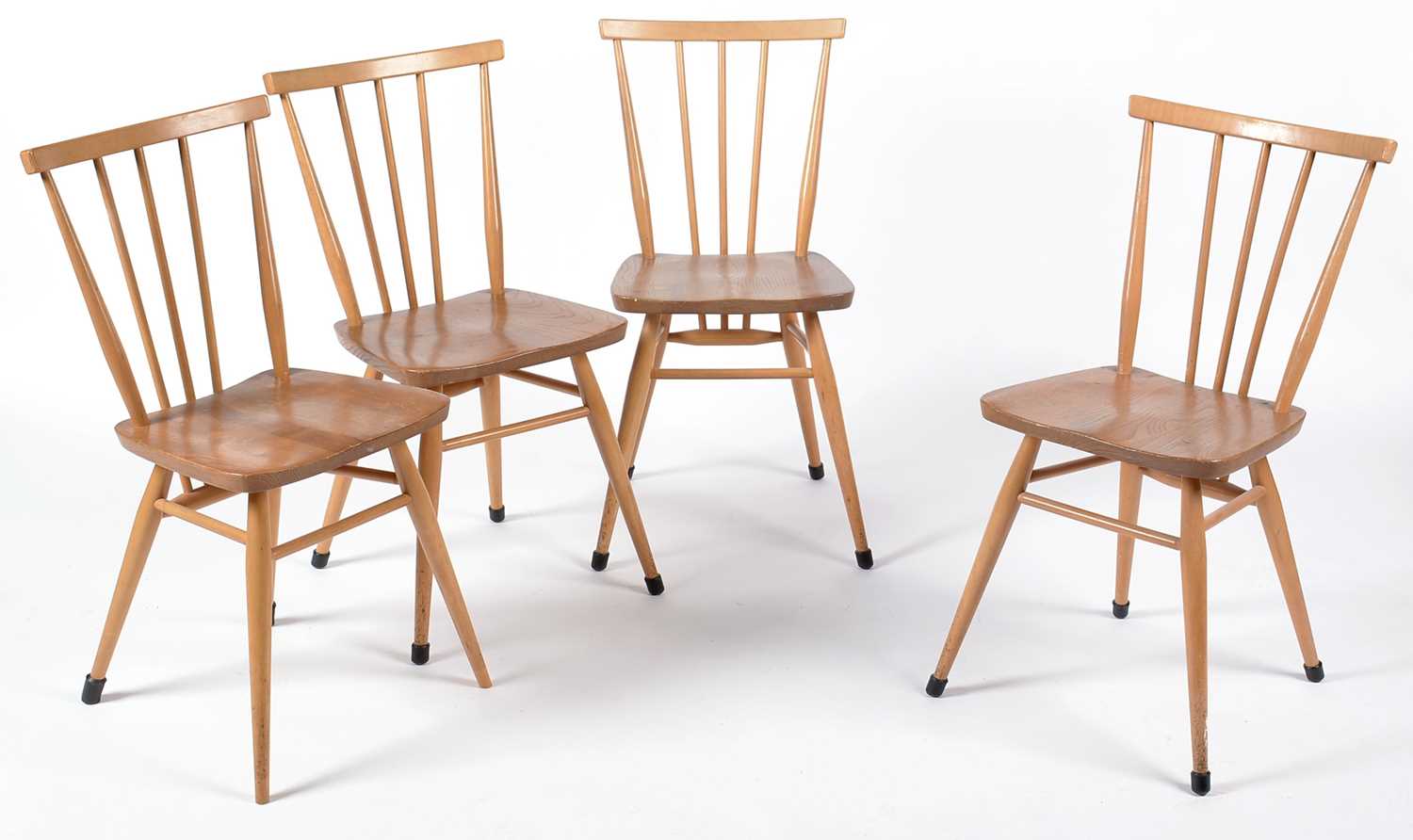 Lot 625 - Ercol: set of four elm and beech No. 391 all-purpose Windsor chairs.