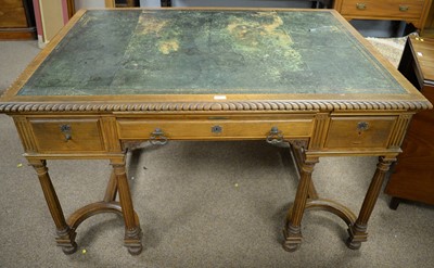 Lot 86 - An early 20th Century walnut partners desk