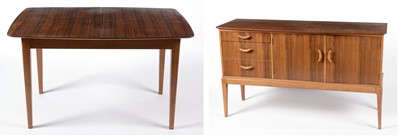 Lot 629 - 1950's walnut sideboard; and matching dining table.