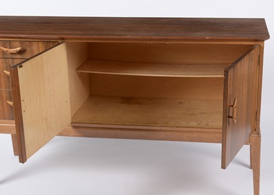 Lot 629 - 1950's walnut sideboard; and matching dining table.