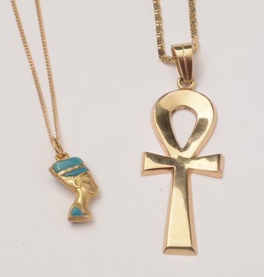 Lot 51 - Two Egyptian gold pendants.