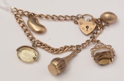 Lot 52 - A 9ct yellow gold charm bracelet