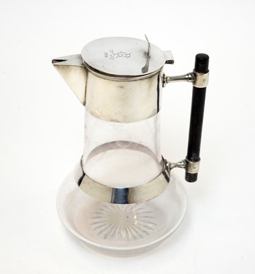 Lot 395 - Christopher Dresser style claret jug