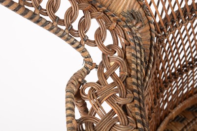 Lot 637 - An Emmanuelle wicker peacock chair, 1970's