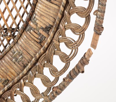 Lot 637 - An Emmanuelle wicker peacock chair, 1970's
