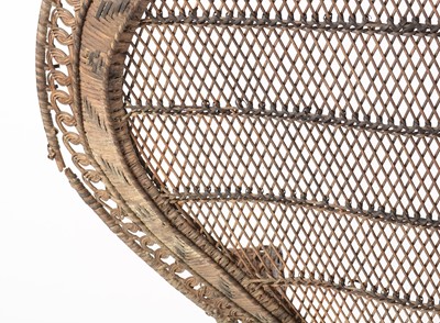Lot 637 - An Emmanuelle wicker peacock chair, 1970's