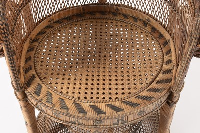Lot 637 - An Emmanuelle wicker peacock chair, 1970's