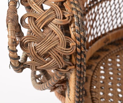 Lot 637 - An Emmanuelle wicker peacock chair, 1970's