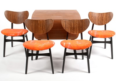 Lot 639 - G-Plan: a 'Librenza' tola wood and black lacquered drop leaf table and four dining chairs.