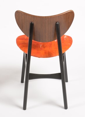 Lot 639 - G-Plan: a 'Librenza' tola wood and black lacquered drop leaf table and four dining chairs.