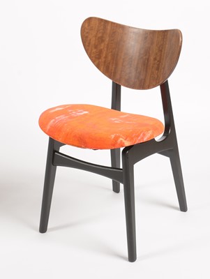 Lot 639 - G-Plan: a 'Librenza' tola wood and black lacquered drop leaf table and four dining chairs.
