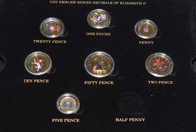 Lot 132 - A collection of assorted coins, and a group of various coin collector guide books.