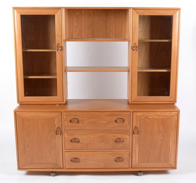 Lot 645 - Ercol: an elm Windsor dresser/display unit.