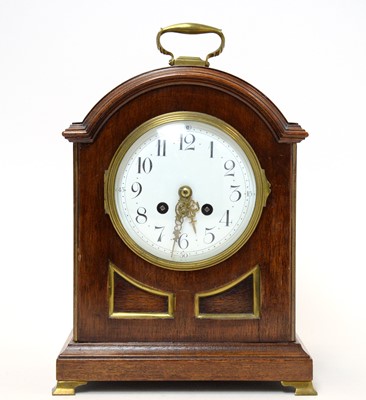 Lot 564 - Victorian walnut mantel clock.