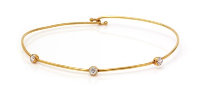 Lot 108 - A diamond and yellow metal choker necklace