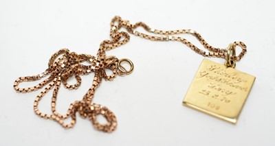 Lot 194 - A Jack Spencer 9ct gold ingot pendant on chain.