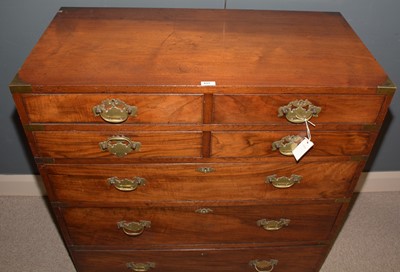 Lot 651 - A 19th Century Irish mahogany campaign chest by Ross & Co, Dublin.