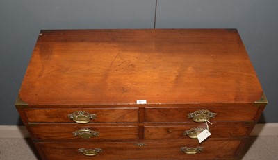 Lot 651 - A 19th Century Irish mahogany campaign chest by Ross & Co, Dublin.