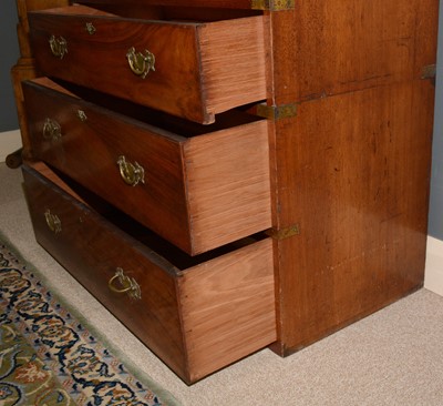 Lot 651 - A 19th Century Irish mahogany campaign chest by Ross & Co, Dublin.