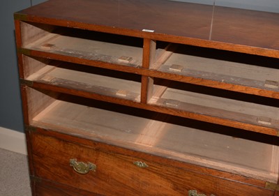 Lot 651 - A 19th Century Irish mahogany campaign chest by Ross & Co, Dublin.