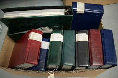 Lot 517 - A collection of eight albums of cigarette cards, and a postcard album