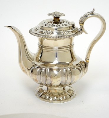 Lot 144 - A George IV silver coffee pot