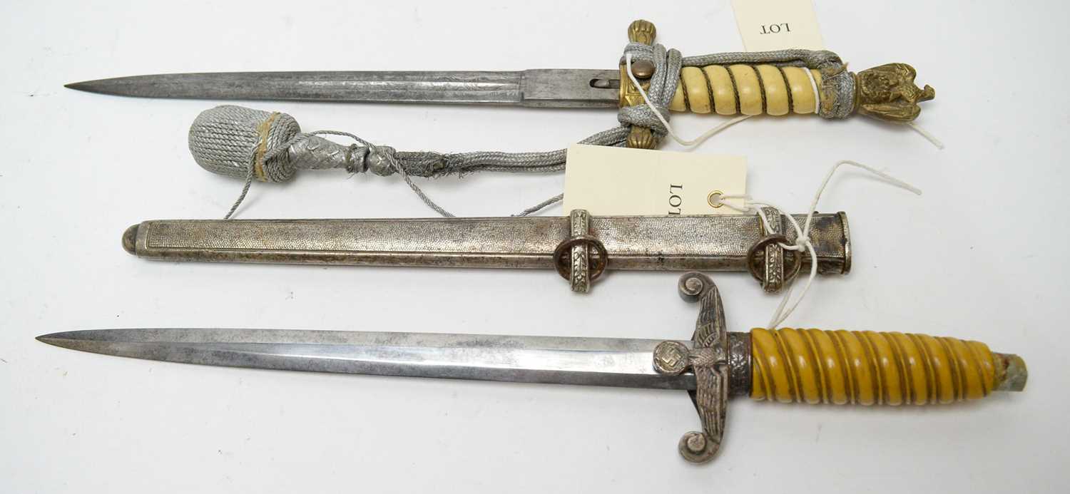 Lot 439 - Two German WWII daggers.