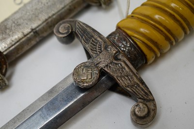 Lot 439 - Two German WWII daggers.