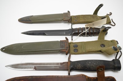 Lot 451 - Four fighting knives.